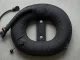 Schwarzer Donut-Wing aus Cordura mit Faltenschlauch, Inflatoreinheit und tellerfoermigem Ueberdruckventil